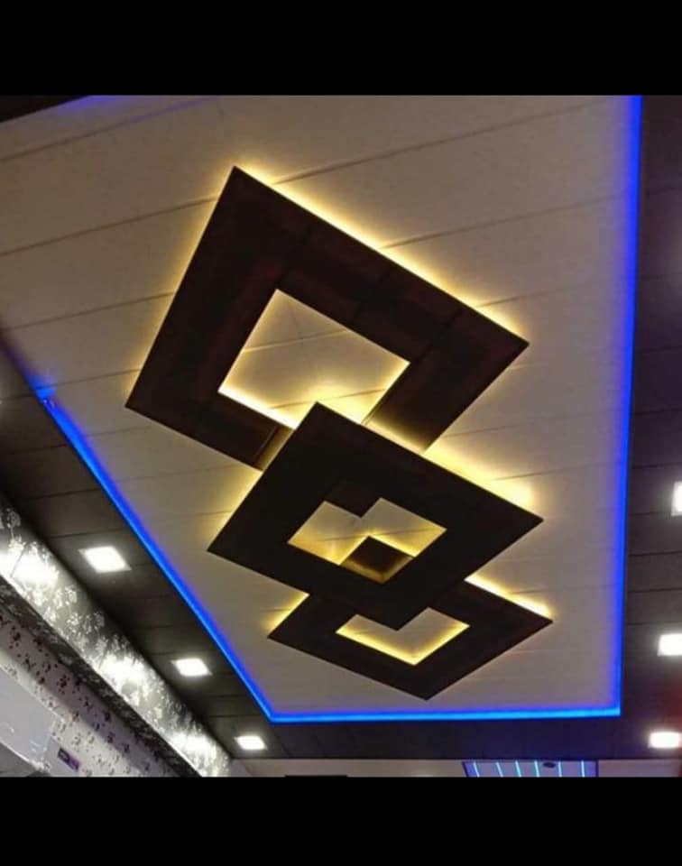 Geometric false ceiling with warm lighting